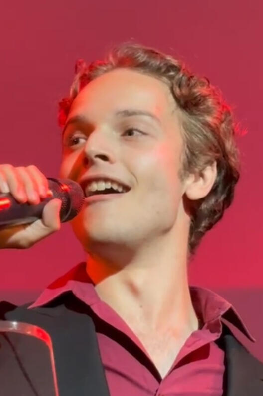 Singing at a business event.